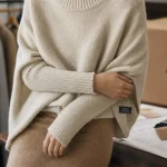 Poncho avec manche en tricot, chaleur et liberté de mouvement